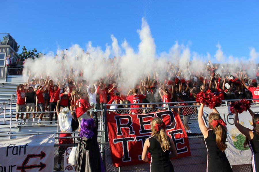 Red Tide and their signature baby powder show reporter Gayle Anderson (dressed as a Cathedral Phantom) who has the most school spirit.