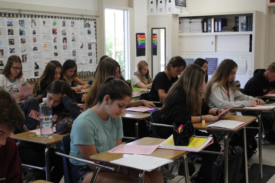 Students work in a crowded classroom, which appears to be the norm. Here, Ms. Ruizs English 1 Honors class works in a room of 39 students.