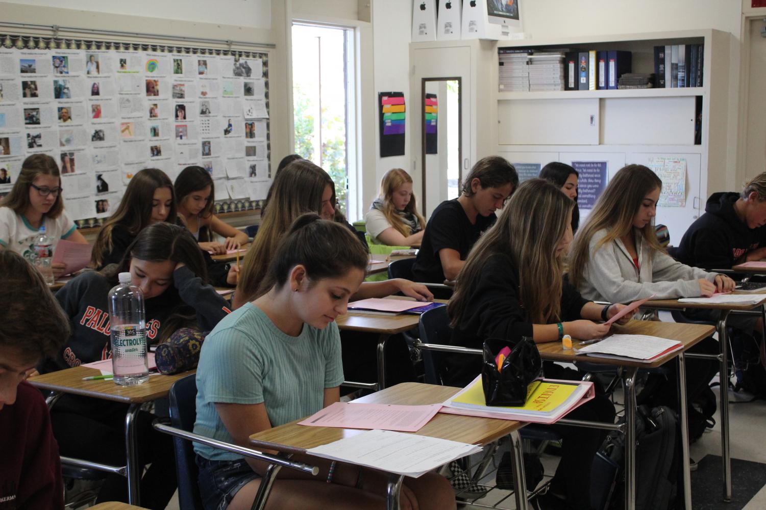 Students work in a crowded classroom, which appears to be the norm. Here, Ms. Ruiz's English 1 Honors class works in a room of 39 students.