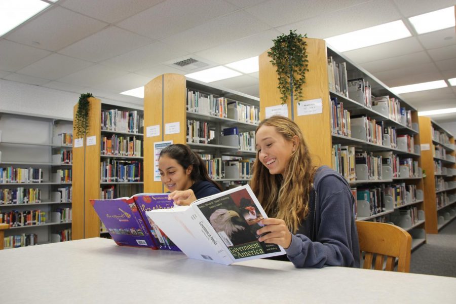 Juniors Shannon Aguilar and Ryan Ammann prepare for upcoming exams in the library.