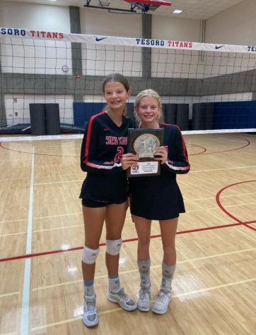 Twins Molly and Mallory LaBreche pose with the Tesoro Championship Trophy. 
(Photo courtesy of Mallory LaBreche)