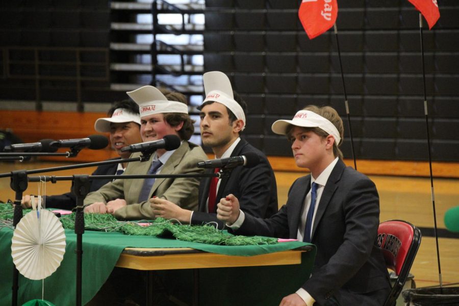 (from left to right) Matthias Yee, Grant Walther, Sam Malekzadeh and Will Bray listen intently to the next Scholar Quiz question. Their team took home the championship. (Photo by Luka Ardon)